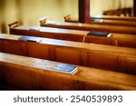 The Holy Bible in church on a bench before confession