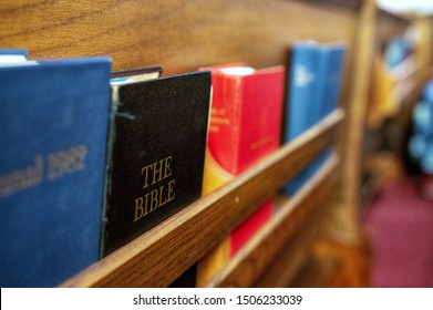 Holy Bible In Church Pew