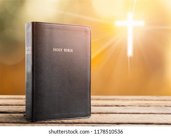 Holy Bible With Eye Glasses And Note