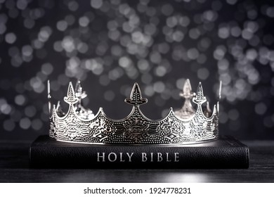The Holy Bible and a Kings Crown on a Dark Moody Background