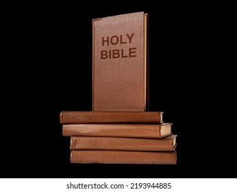 Holy Bible On Books Stack. Religious Texts, Scriptures. Christianity, Judaism Religion. High Quality Photo