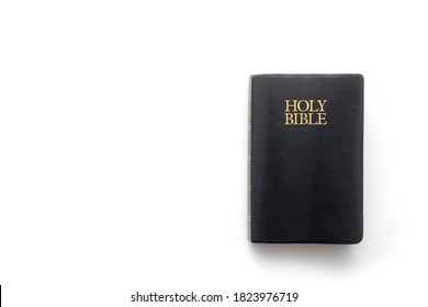 Holy Bible on white with copy space