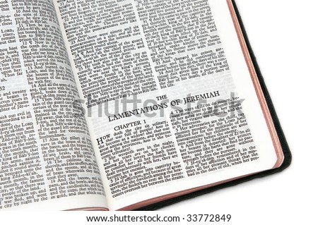 holy bible open to the the lamentations of jeremiah, on white background
