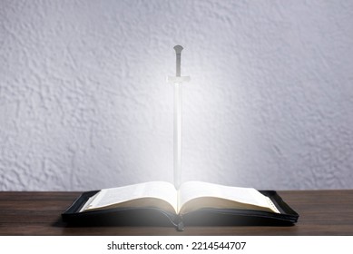 The Holy Bible is open. The Word of God is a sword.