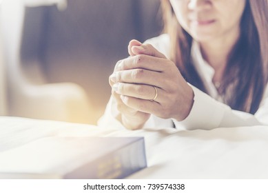 Holy Bible Prayer Believe In God Church. Woman Hands Pray Christian Bible For God Blessing Wishing Better Life. Begging Forgive And Believe Goodness. Christian Life Crisis Prayer To God In Church.