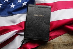 Holy Bible with the american flag, a Photo by Javier Art Photography