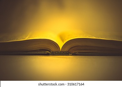 Holy Book On A Yellow Background