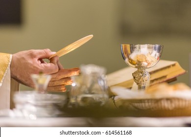 Holy bread rite during the Catholic Mass - Shutterstock ID 614561168