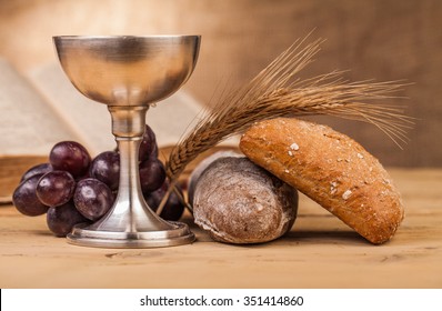 Holy Communion Chalice On Wooden Table