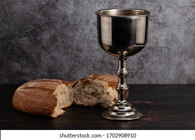 Holy Communion Chalice With Wine And Bread.