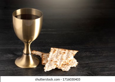 Holy Communion Or The Lords Supper On A Black Wood Table