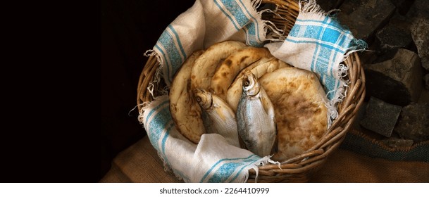 Holy fresh raw simple rural box barley pita cake bakery Lord pray bless retro Israel sign story. Close up view white jew towel cloth catch catholic supper still life dark black stone field text space
