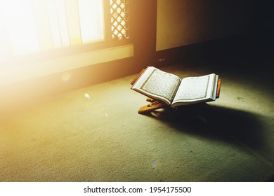 Holy Qur'an inside the mosque with sunlight 