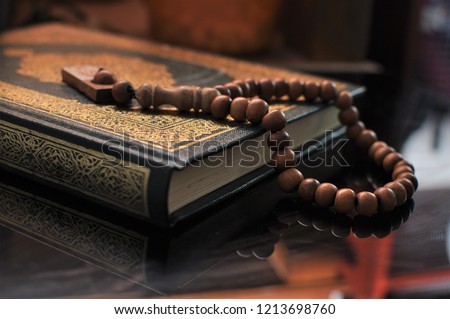 The holy Quran with tasbih/rosary beads