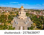 Holy Trinity Cathedral or Tsminda Sameba Church aerial panoramic view in Tbilisi old town. Tbilisi is the capital and the largest city of Georgia, lying on the banks of the Kura River.