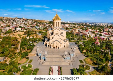 Holy Trinity Cathedral or Tsminda Sameba Church aerial panoramic view in Tbilisi old town. Tbilisi is the capital and the largest city of Georgia, lying on the banks of the Kura River.