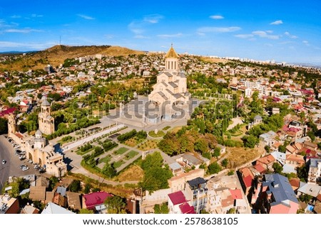 Holy Trinity Cathedral or Tsminda Sameba Church aerial panoramic view in Tbilisi old town. Tbilisi is the capital and the largest city of Georgia, lying on the banks of the Kura River.