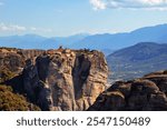 The Holy Trinity Monastery (Agia Triada) on the top of the most impressive and peculiar geological formations in Greece called Meteora rocks