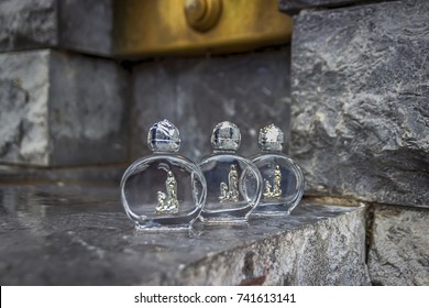 Holy water in a beautiful small bottles. Lourdes, France