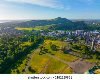 Holyrood Park and Holyrood Palace aerial view from Calton Hill in Edinburgh, Scotland, UK. Old town Edinburgh is a UNESCO World Heritage Site since 1995. 
