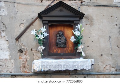 Home Altar On The Wall Of The House.