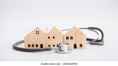 Home Appraisal. House Care And Safety. Village Maintenance Services. Real Estate Inspector. Property Value Estimate. Checking And Consultant Concept. House Models With Stethoscope On White Background.