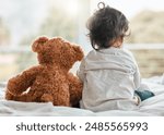 Home, back and baby in in bed with teddy bear, relax and playful with plush toy in bedroom. Family house, toddler and comfort with companion of stuffed animal, sentimental value and childhood