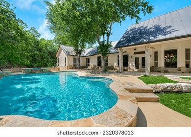A home back yard with a swimming pool 