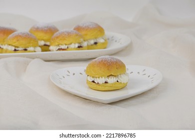 Home Baked Bread Cakes With Cheese. Cheesecakes With Pumpkin Buns Sliced And Stuffed With Creamy Cheese And Sprinkled With Sugar Powder. Sweet Sandwich Breads. Brioche With Soft Yellow Crumb.