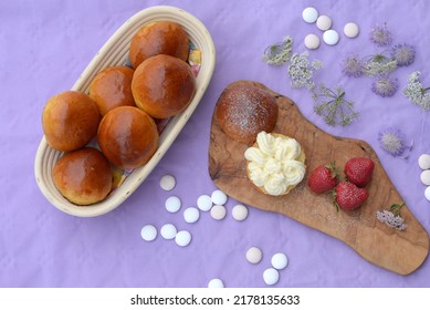 Home Baked Sweet Bread Rolls. Sweet Sandwich Bread With Fresh Cheese Filling And Strawberries On Wooden Board. Sliced Small Bread Stuffed With Creamy Cheese And Milk Buns In Breadbasket.