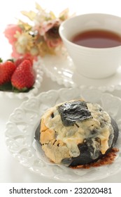 Home Bakery Squid Ink And Cheese Bread With Laver On Top For Fusion Food Image