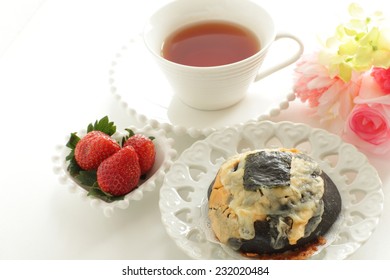 Home Bakery Squid Ink And Cheese Bread With Laver On Top For Fusion Food Image