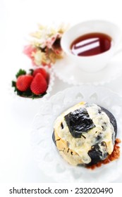 Home Bakery Squid Ink And Cheese Bread With Laver On Top For Fusion Food Image