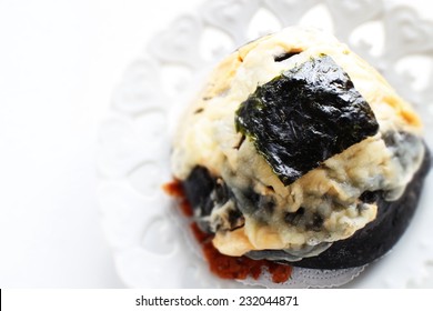 Home Bakery Squid Ink And Cheese Bread With Laver On Top For Fusion Food Image