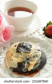 Home Bakery Squid Ink And Cheese Bread With Laver On Top For Fusion Food Image