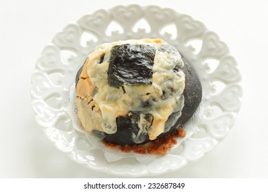 Home Bakery Squid Ink And Cheese Bread With Laver On Top For Fusion Food Image