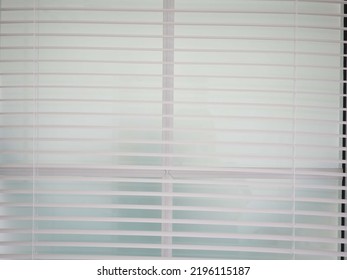 Home Blinds - Cordless Cellular Honeycomb Pleated Shade  Automated Curtains Blind. Closeup Photo, Blurred.