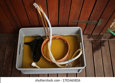 Home Brewing Equipment Being Sanitized In A Tub. Homebrewing Concept Image. 