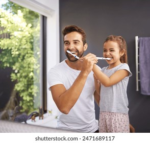 Home, brushing teeth and father with girl, cleaning mouth and morning routine with hygiene. Family, dad and daughter with fresh breath, grooming or oral care with dental wellness, healthy or bathroom - Powered by Shutterstock