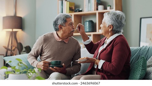 Home, cake and elderly couple with coffee for love, bonding and funny conversation on sofa. Senior people, happy and relax with dessert for afternoon communication, discussion and peace in retirement - Powered by Shutterstock