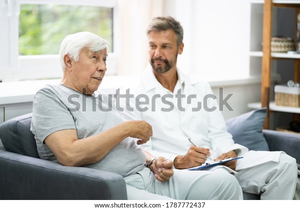 Home Care Elder\
Patient Talking To His\
Doctor