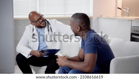 Home Care Patient Talking To His Doctor