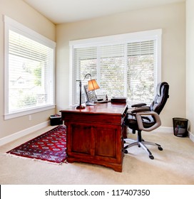 Home Classic Office With Mahogany Desk And Leather Chair.