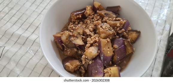 Home Cook Stir Fried Brinjal With Minced Pork. Selective Focus.