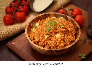 Home Cooked Spanish Rice Served In A Wooden Bowl, Selective Focus