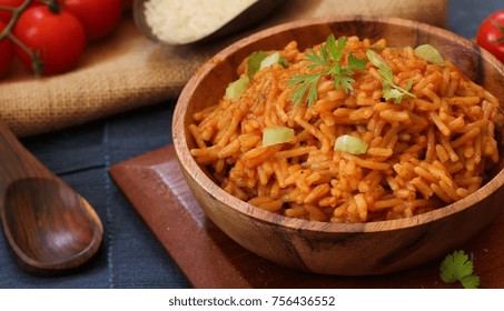 Home Cooked Spanish Rice Served In A Wooden Bowl, Selective Focus