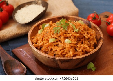 Home Cooked Spanish Rice Served In A Wooden Bowl, Selective Focus