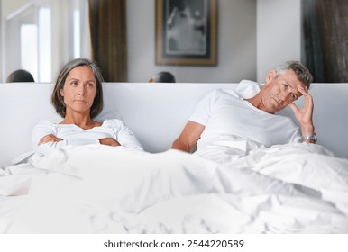 Home, couple and angry in bed with argument for disagreement, conflict and problem. Mature people, toxic relationship and sad in bedroom at apartment with fight, disappointed and marriage issues - Powered by Shutterstock