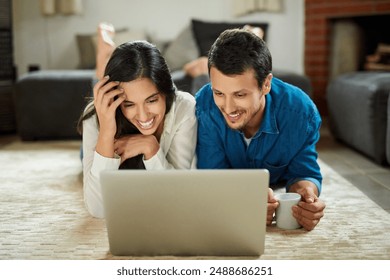 Home, couple and relax on carpet with laptop, streaming series and romantic film for movie night in lounge. Married people, woman and man with computer for watching, entertainment or bonding in house - Powered by Shutterstock