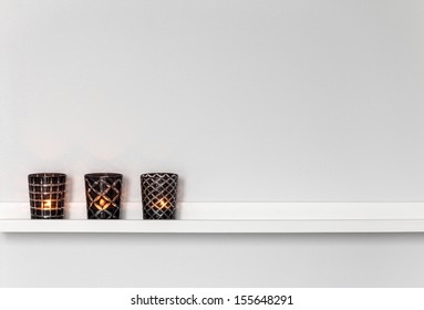 Home Decor, Candle Lights On A White Shelf.